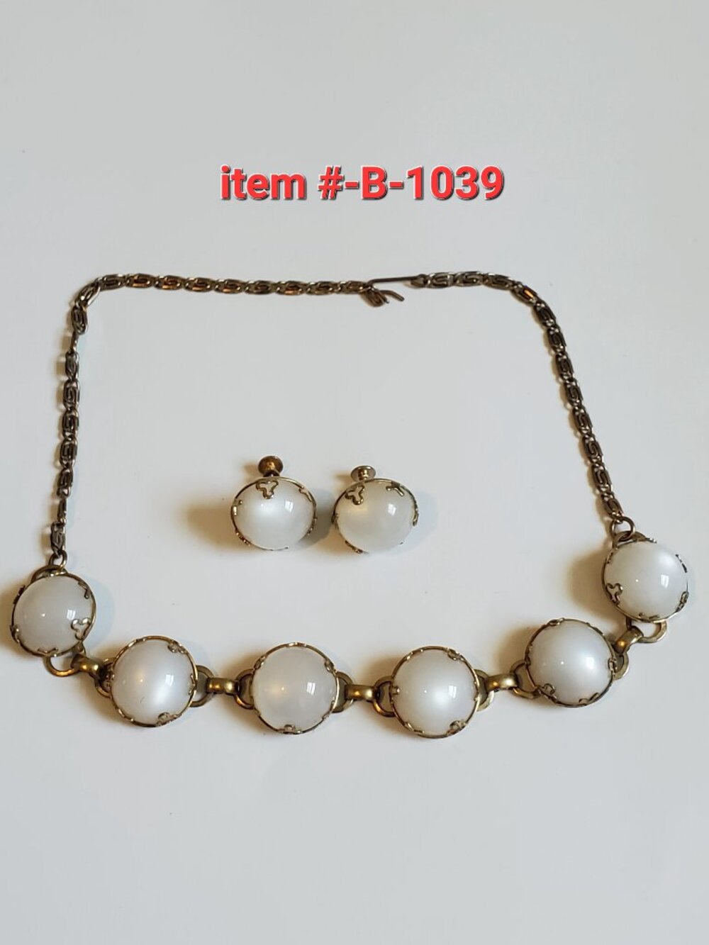 1 Necklace with matching screw on Earrings, item # B-1039,.  wt 43 grams.